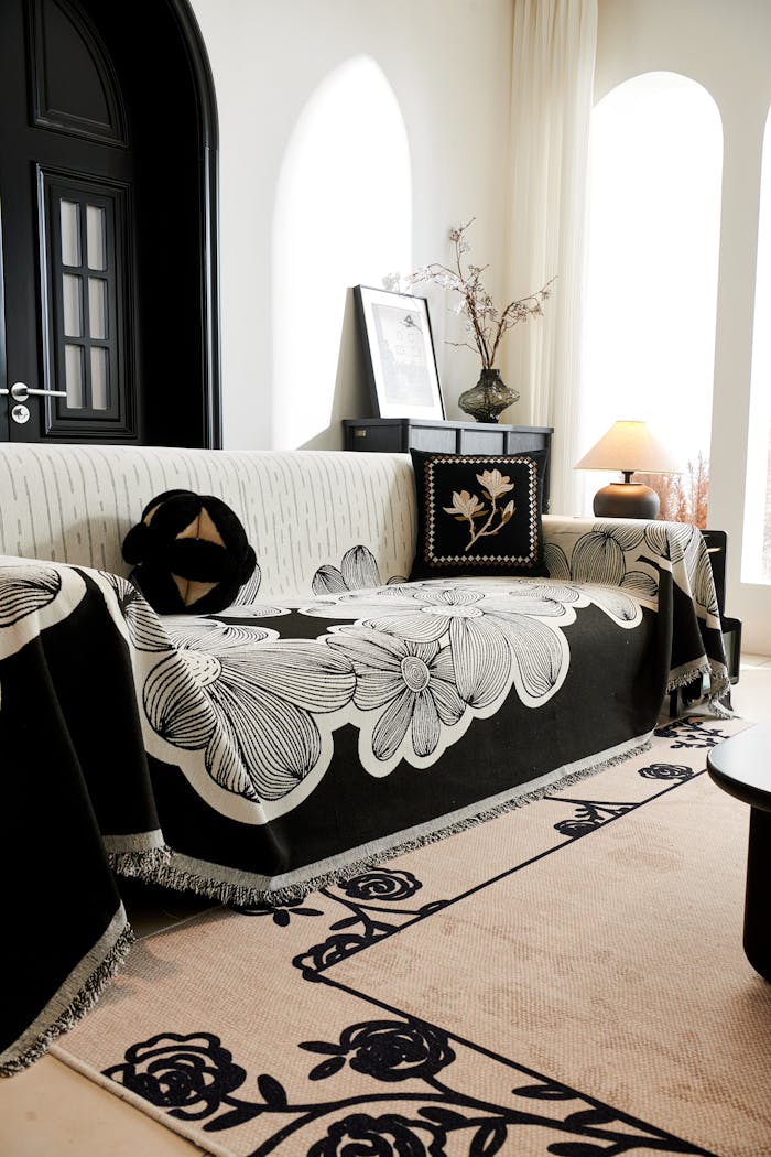 gallery-03 Stylish living room featuring floral slipcovers on sofa and decor accents.